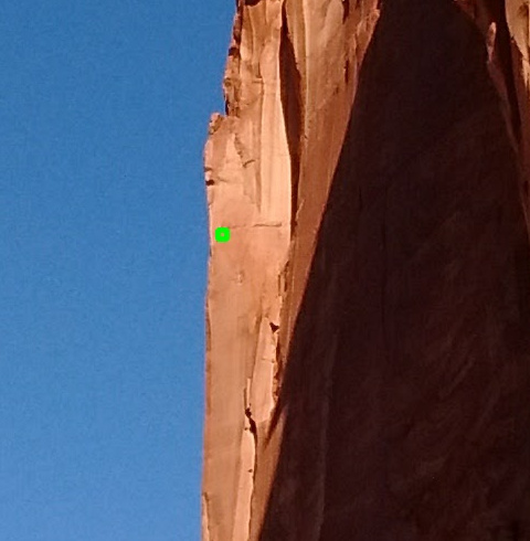 A magnified version of the same photograph with the eight by eight block of pixels.